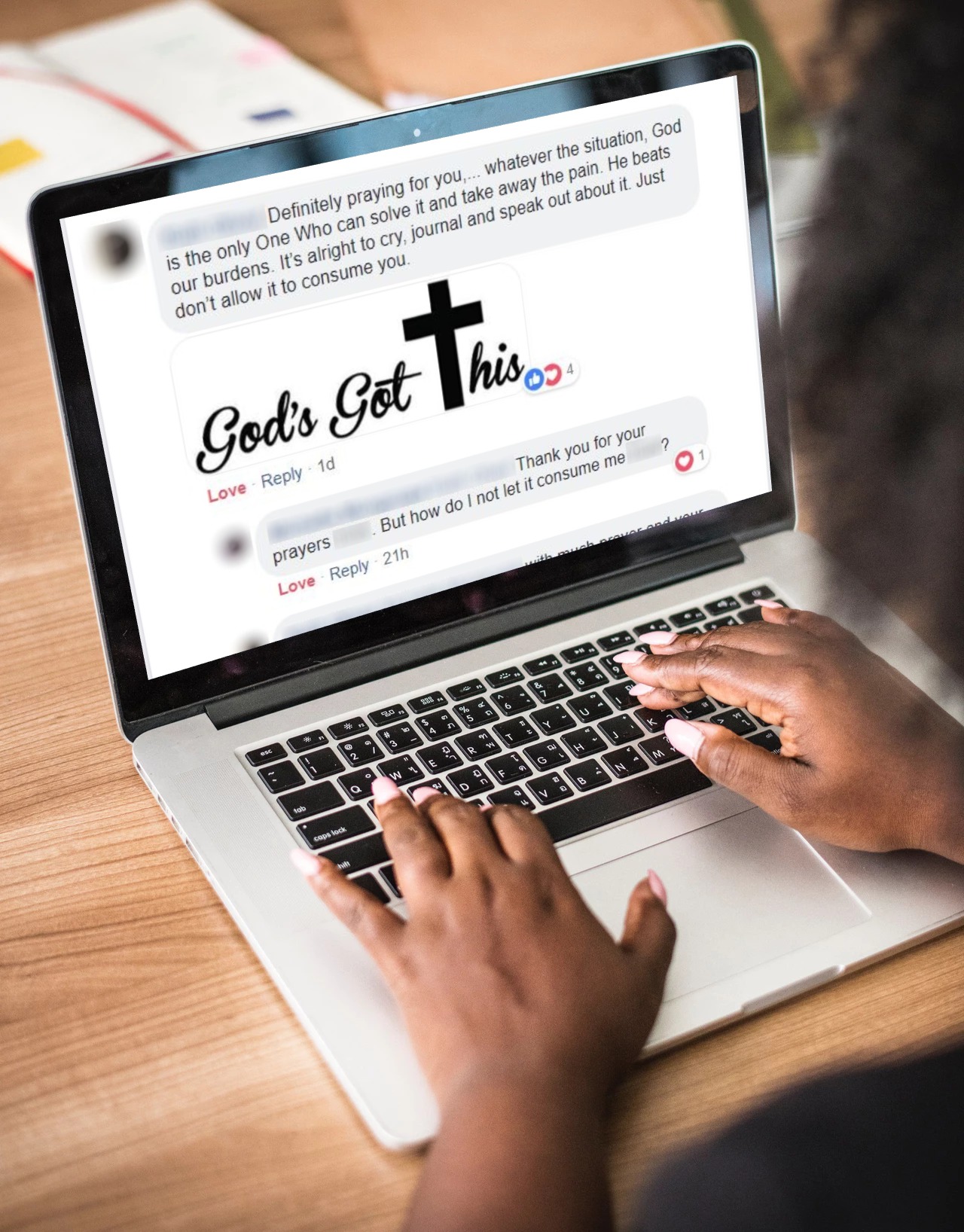 a person typing on a laptop